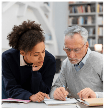 Person with headphones working on laptop